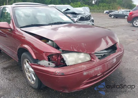 2000 Toyota Camry Le from USA, damaged, VIN JT2BG22K3Y0521541